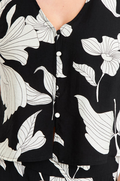 Blusa sin Mangas Negra con Flores Blancas