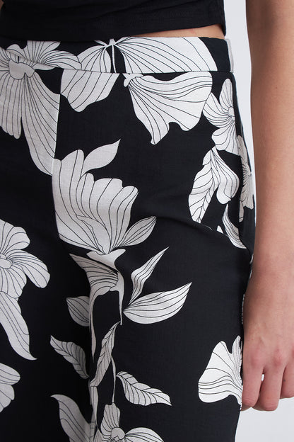 Pantalón Negro Flores Blancas
