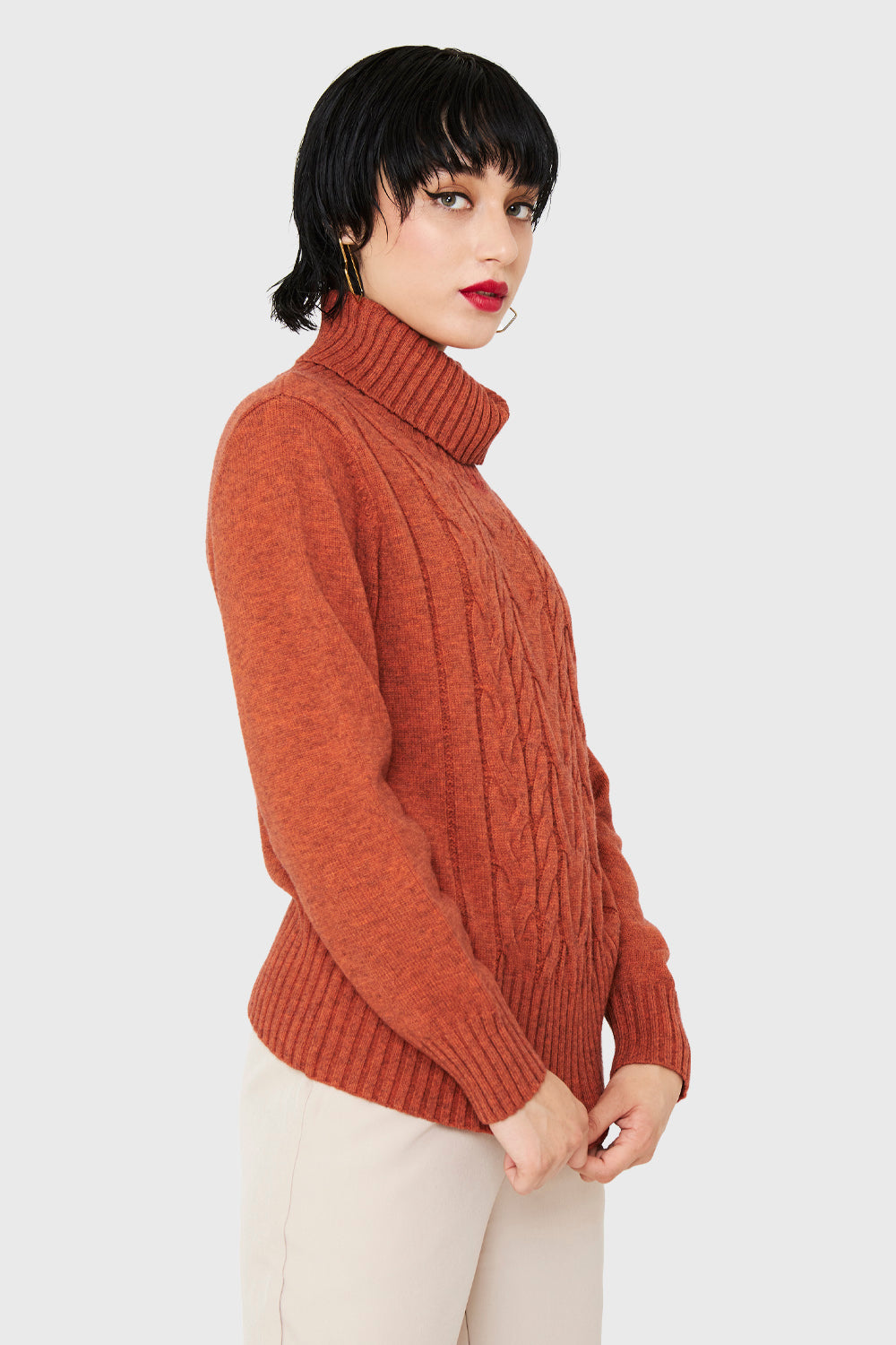 Sweater Cuello Alto Trenzas Naranja